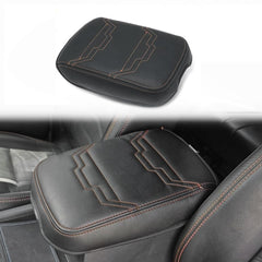 Muslogy Nissan Frontier center console cover with orange trim protects the console from wear.