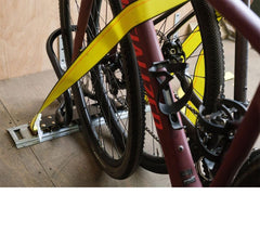 Installation diagram showing Mytee wheel chock mounting into E-Track system.