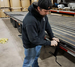 Mytee strap winder reduces strap tangling during setup