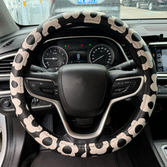 Naxizo microfiber leather soft-touch steering cover for comfortable grip.