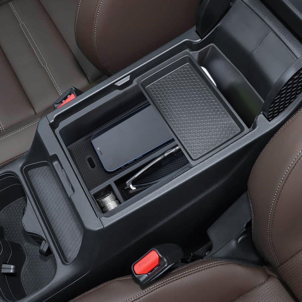 Two-layer storage design provides easy access to keys, phone, and small items while driving.