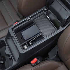 Two-layer storage design provides easy access to keys, phone, and small items while driving.