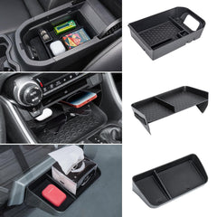 Under-armrest storage with Neepiar tray maximizes space in RAV4.