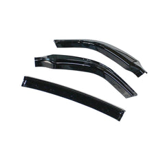 NeespoC gloss black front spoiler enhances the vehicle’s sleek appearance.