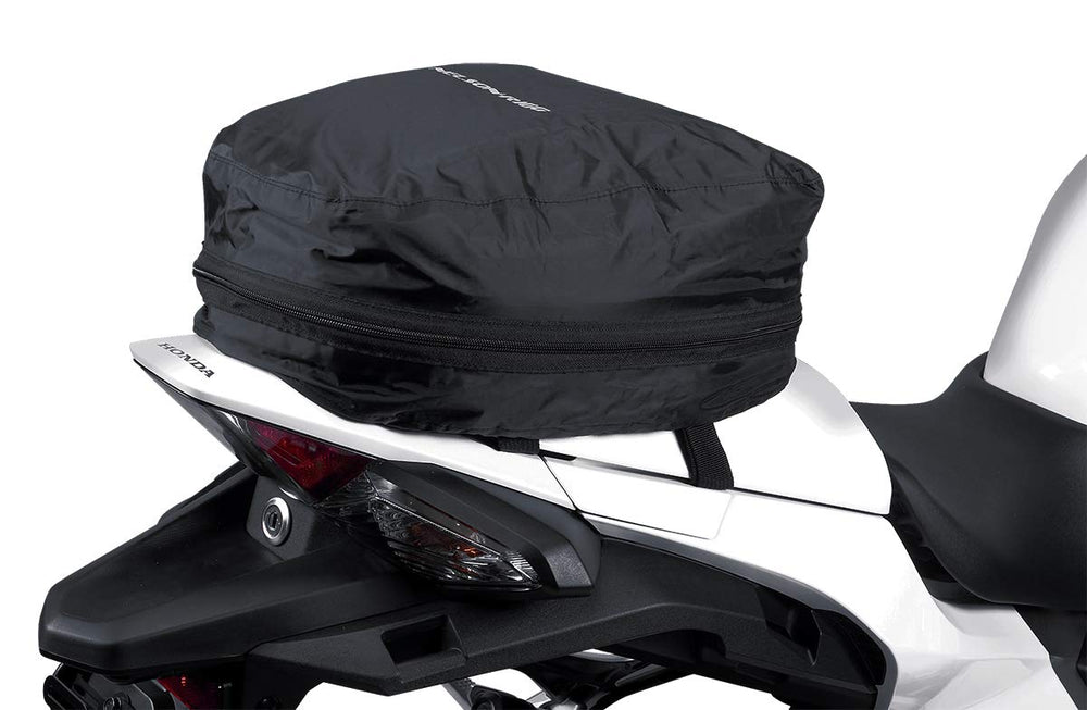 Interior with self-fastening straps and mesh organizer for organized gear.
