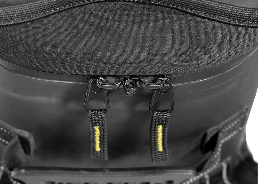 Nelson-Rigg waterproof flap shields zippers from dust and weather.