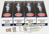 NGK 2477 iridium spark plug closeup showcasing durable electrode design for longevity.