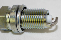 NGK spark plug in-use image hints at reliable starts and steady drive