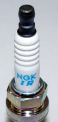 Rugged spark plug body with durable metal shell detail