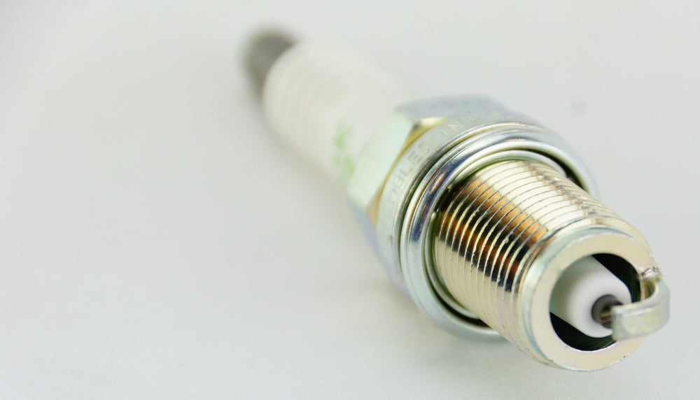 NGK 6953 spark plug BKR5E-11 assembled, designed for efficient engine fit.