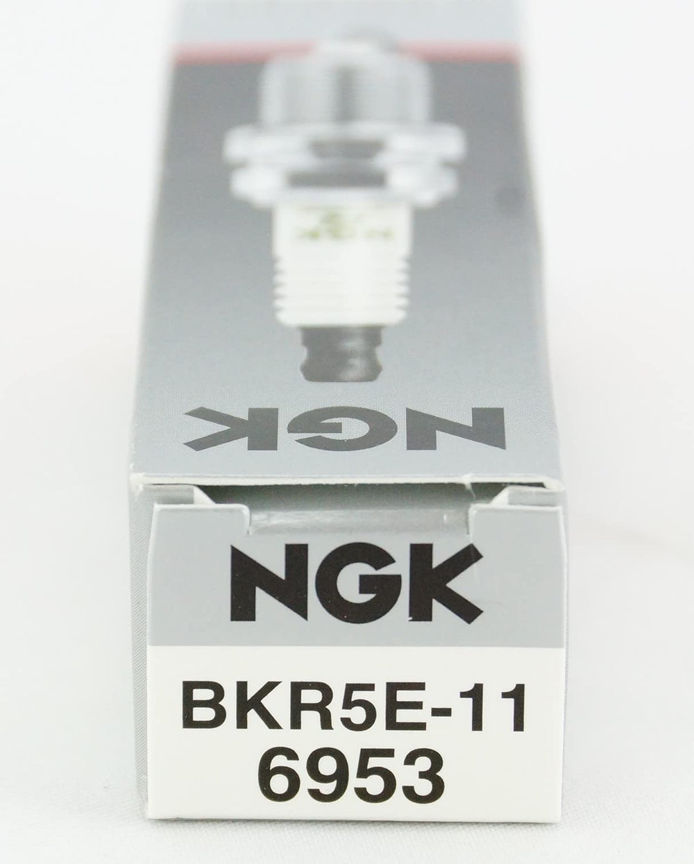 NGK 6953 spark plug BKR5E-11 durable ceramic design, long-lasting reliability.