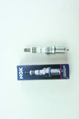 Close-up of Iridium IX spark plug tip highlighting durability