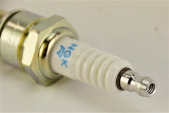 NGK BPR6ES 7131 spark plug in engine bay shows OEM-fit