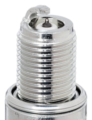 NGK BR7EIX tapered ground electrode seen for reduced electrical quenching.