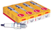 NGK CR6HSA spark plug bulk-pack showing four units ready for installation.