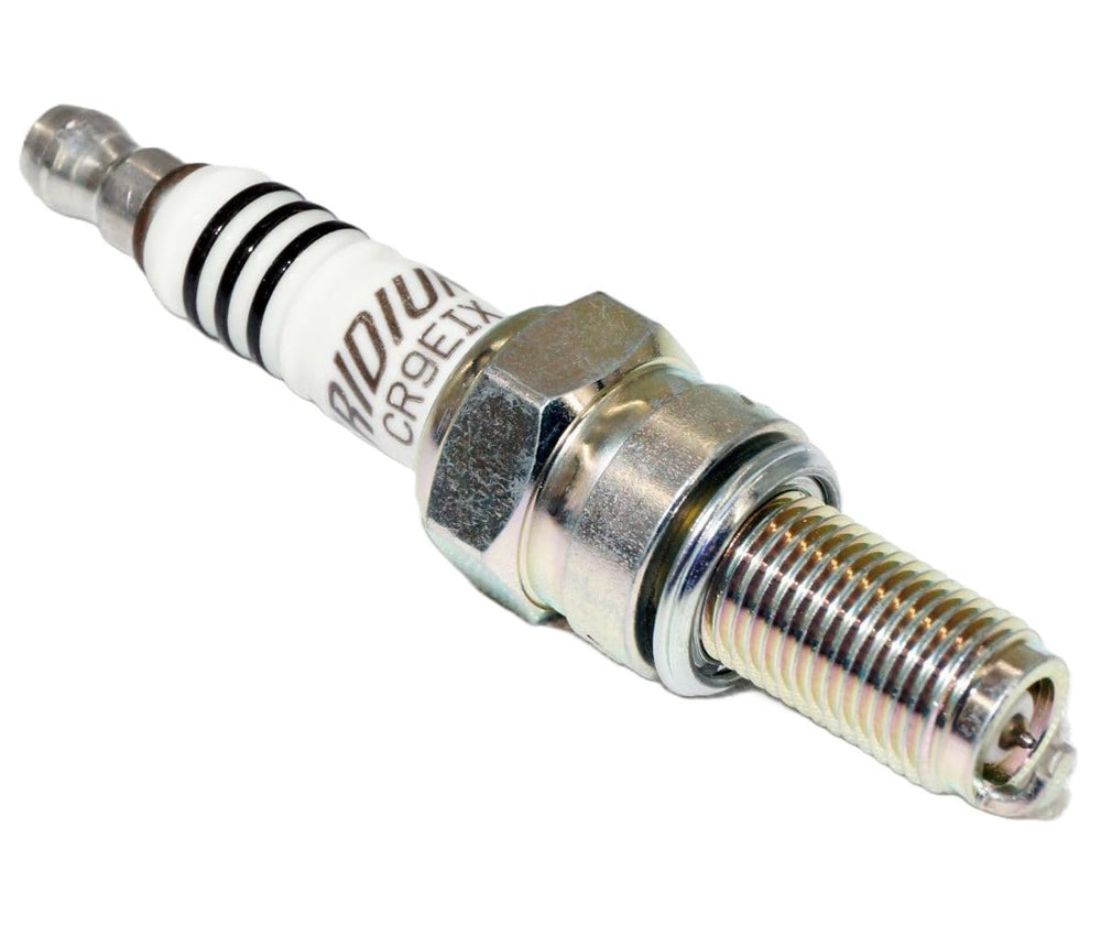NGK CR9EIX spark plug installed in engine bay ready for service