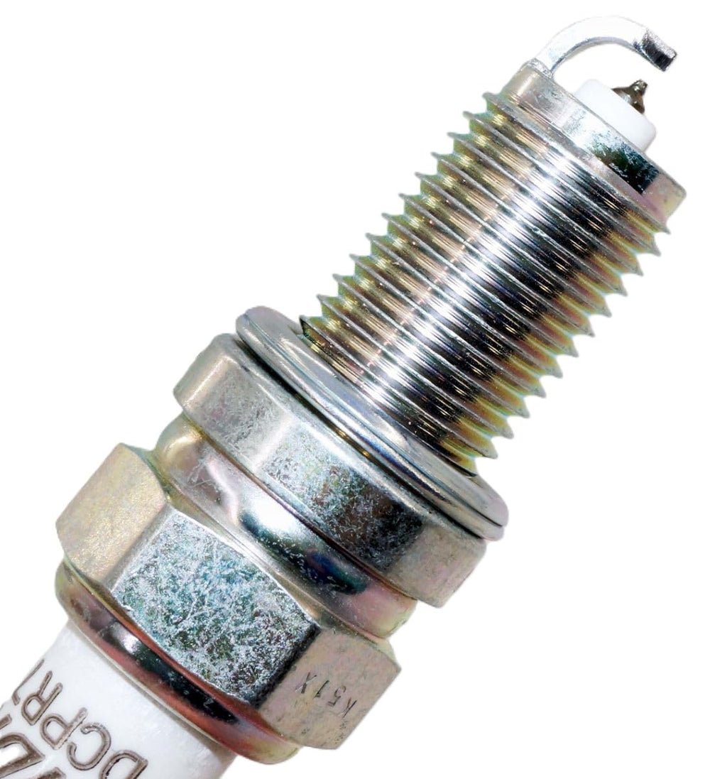 NGK DCPR7EIX spark plug in engine bay demonstrating fitment.
