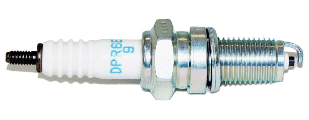 Copper center electrode detail highlights heat dissipation and performance in engines