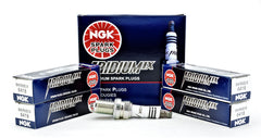NGK Iridium IX 6418 spark plug close-up showing durable electrodes for reliable ignition.