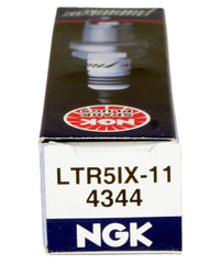 Close view of spark plug gap and electrode alignment