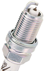 NGK Iridium IX spark plug tip closeup showing precision ignition capability for performance engines