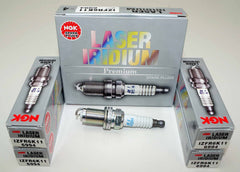 NGK IZFR6K11 spark plug four-pack front view for reliable ignition and easy replacement.