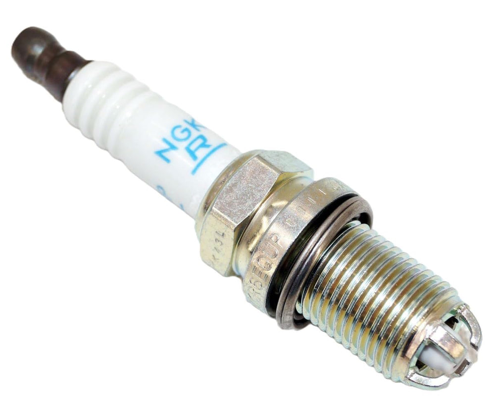 NGK spark plug packaging with branding emphasizing durability