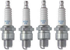NGK spark plugs installed in engine compartment for dependable performance.