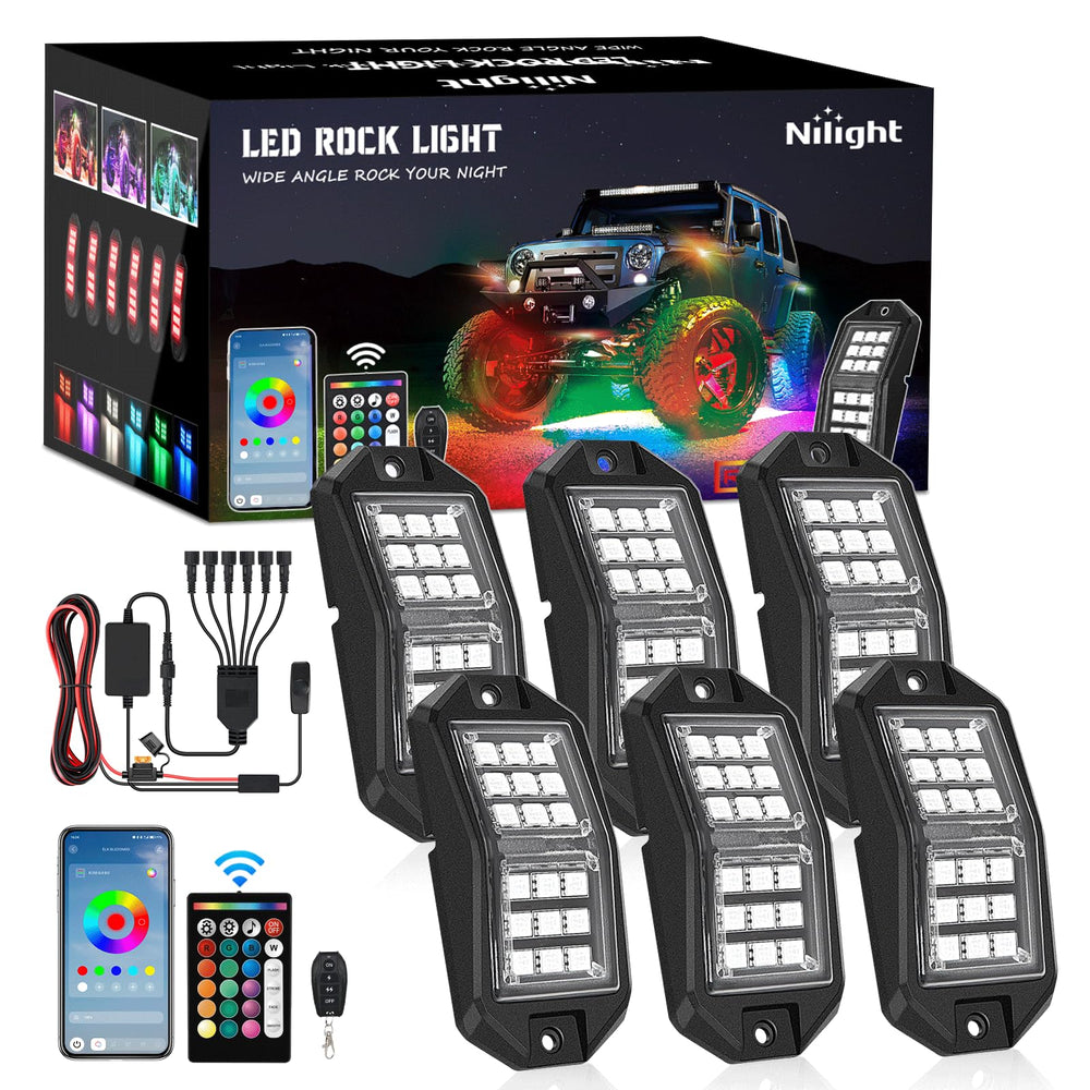 Nilight RGB rock lights illuminate wheel wells with a broad, vivid glow.