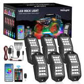 Nilight RGB rock lights illuminate wheel wells with a broad, vivid glow.
