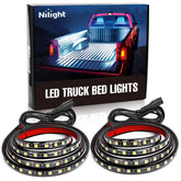 Nilight TR-05 bed strip 60-inch 180 LEDs lighting the truck bed for easier loading.