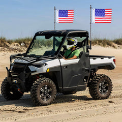 Dune flag mount option paired with whip light for off-road trips.