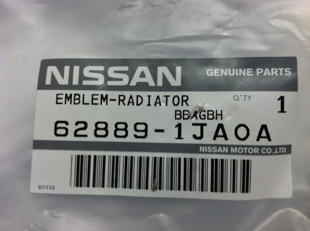 Nissan emblem on Rogue grille with chrome detailing