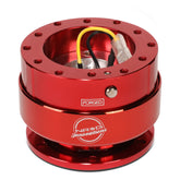 NRG Innovations SRK-200RD-TI red body close-up highlights premium grip and bold styling.