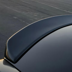 Oasiland trunk lip spoiler on Chrysler 300 creates a refined line.