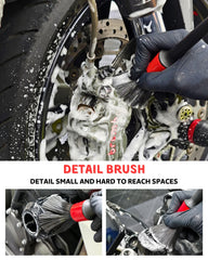 Oesee Detailing Brush reaches crevices for precise cleaning on engine and frame.