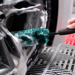 oesee detailing brush reaching lug nuts for precise cleaning