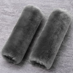 OGLAND fluffy seatbelt cover graphite delivers plush warmth on long drives.