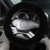 OGLAND fluffy wool sheepskin steering wheel cover in black close-up showing plush texture for comfort