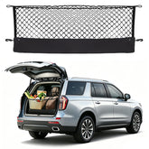 Omocyra envelope-style cargo net installed in a Tahoe trunk keeps items organized.