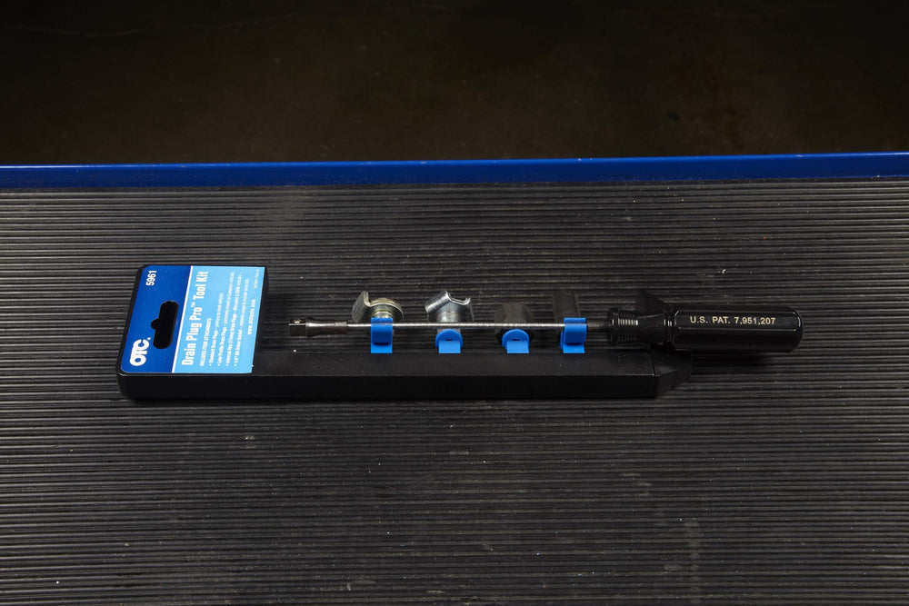 OTC Drain Plug Pro Tool Kit magnetic attachment secures plug during extraction