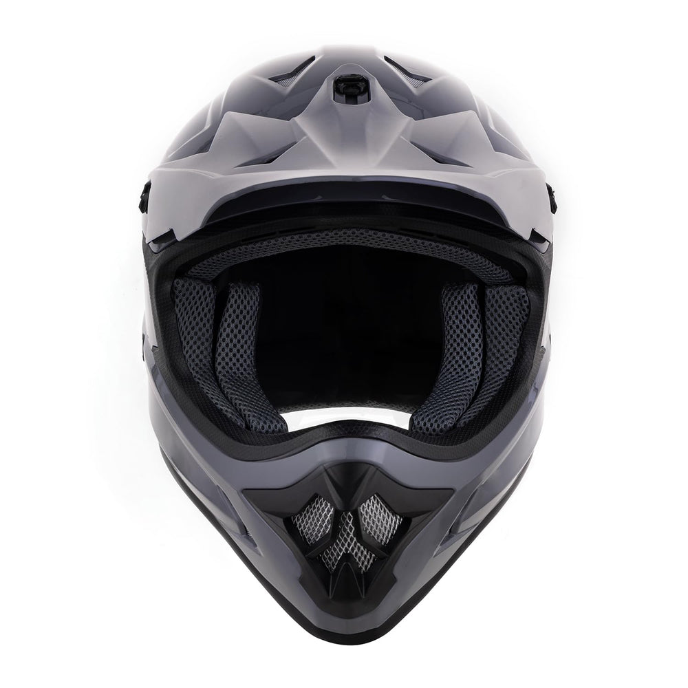 OUMURS dirt bike helmet packaging shows durable construction and safety standards.