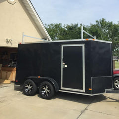 OUTPRIZE rack carries ladders and boards, keeping long cargo secure.