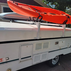 OUTPRIZE trailer ladder rack on an enclosed trailer enables efficient transport.
