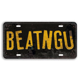 Panguru Jeepers Creepers BEATNGU embossed plate with raised letters for display.