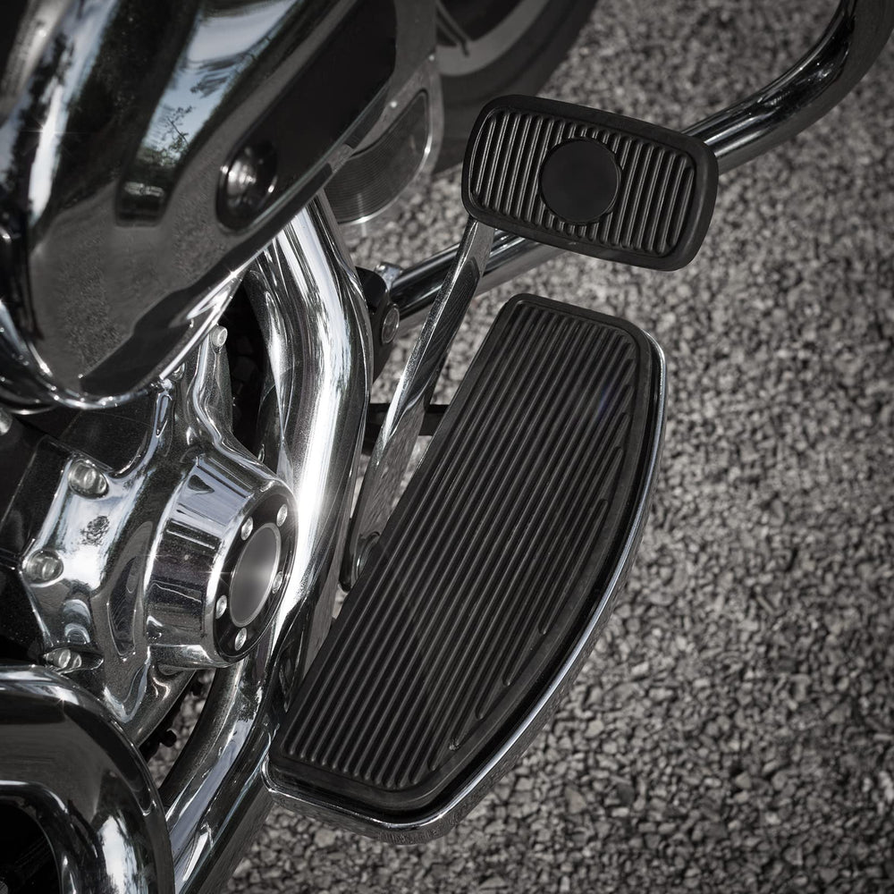 Non-slip rubber grip enhances stability on Harley front footboard.