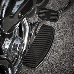 Non-slip rubber grip enhances stability on Harley front footboard.