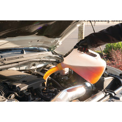 Performance Tool W4046 oil jug with flexible spout reaches tight areas during transfer.