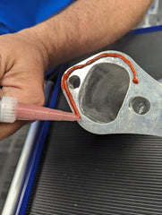 Formed-in-place gasket process using Permatex 81409 for valve covers and oil pans.