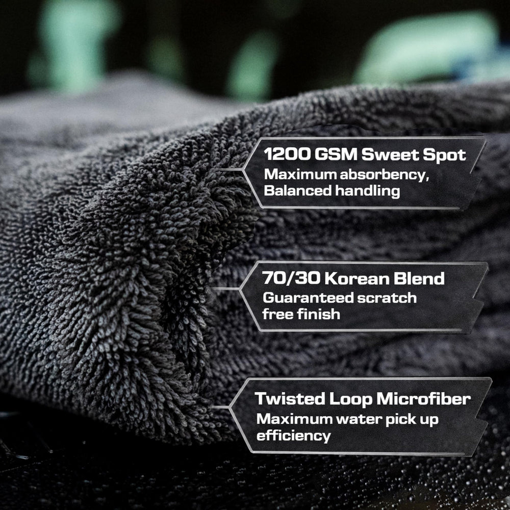 Phinish streak-free glass towel delivering crystal-clear windows after detailing.